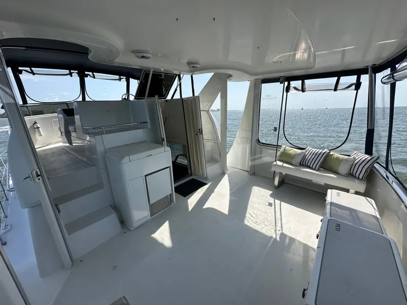 Slide: The Image of Spacious interior of a 2000 Carver 406 Motor Yacht with ocean view. - 9