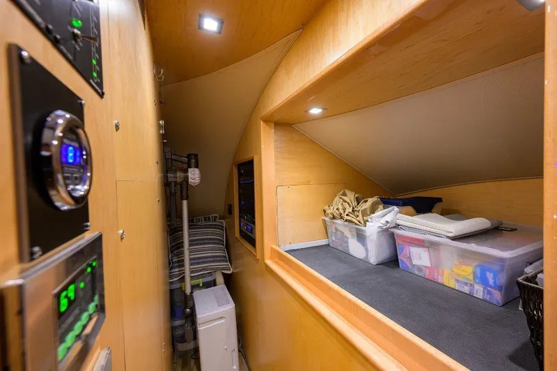 Slide: The Image of Interior of 2020 Viking 72 Convertible yacht with storage and control panels. - 10