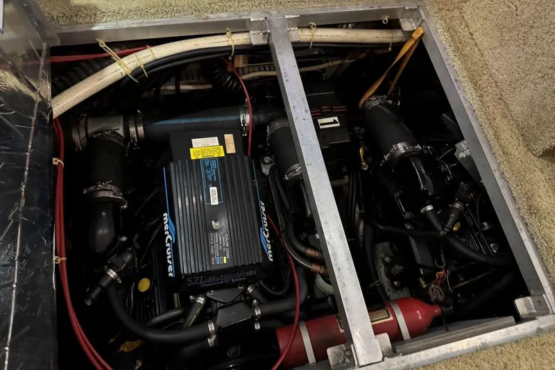 Slide: The Image of Engine compartment of a 1993 Carver 300 Aft Cabin boat with MerCruiser components. - 39