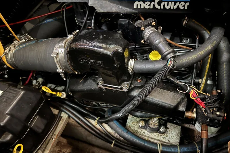 Slide: The Image of Engine compartment of a 1993 Carver 300 Aft Cabin with MerCruiser components. - 41
