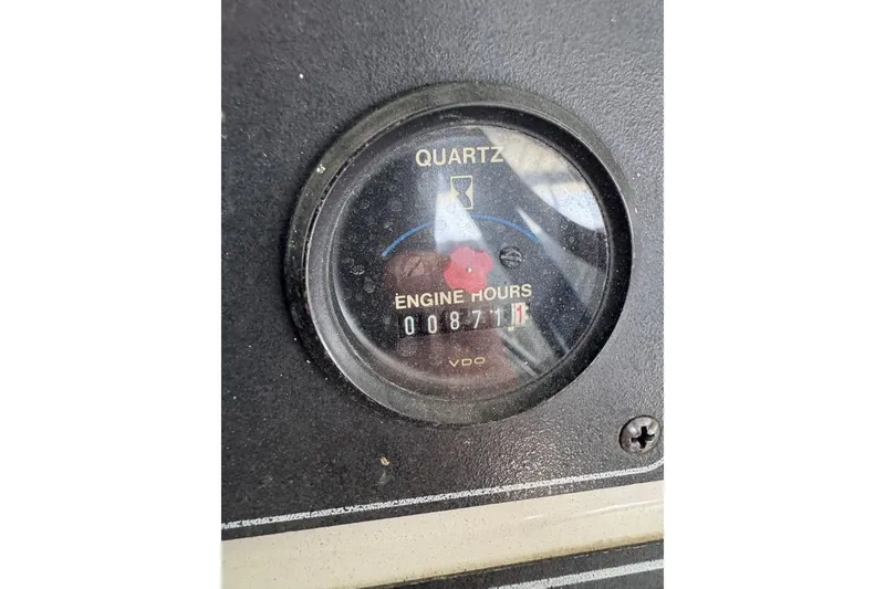 Slide: The Image of Close-up of engine hour meter reading 871 hours on 1993 Carver 300 Aft Cabin. - 47