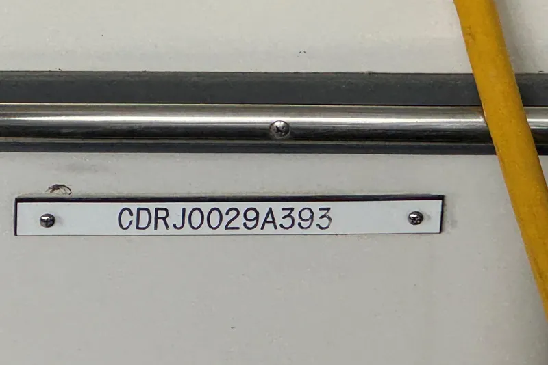 Slide: The Image of 1993 Carver 300 Aft Cabin boat identification plate with serial number CDRJ0029A393. - 8