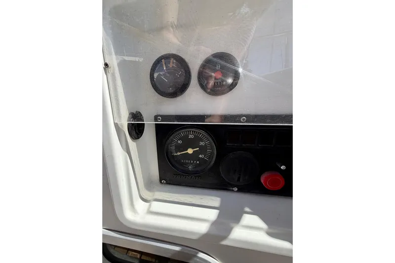 Slide: The Image of Control panel of a 2006 Beneteau Oceanis 523 sailboat with gauges and dials. - 20