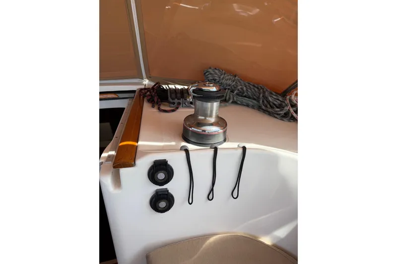 Slide: The Image of Winch and ropes on 2006 Beneteau Oceanis 523 sailboat deck. - 25