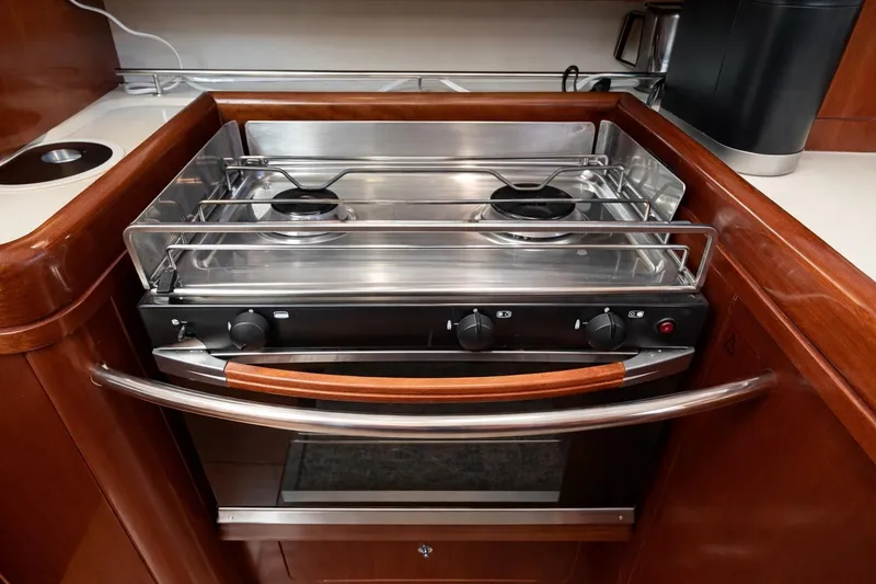 Slide: The Image of Stainless steel stove in 2006 Beneteau Oceanis 523 yacht kitchen. - 43