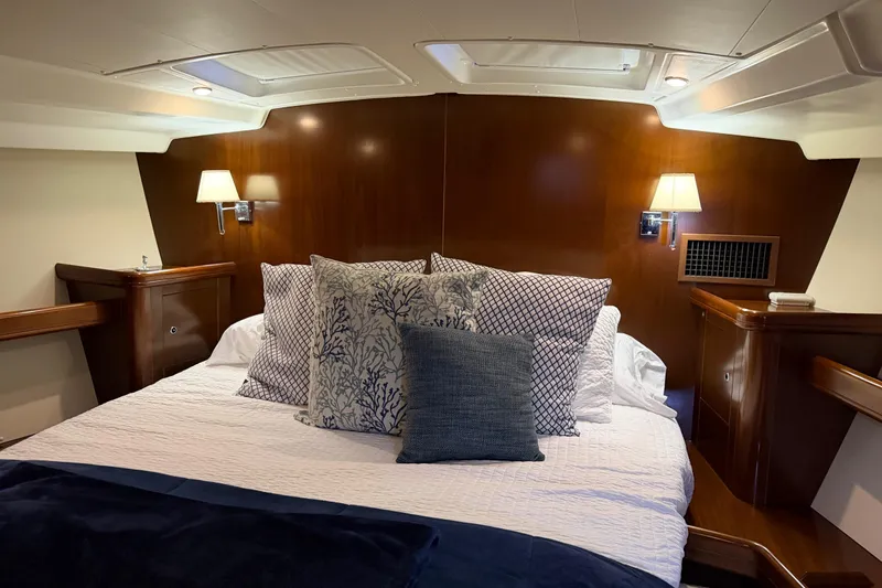 Slide: The Image of Luxurious cabin interior of 2006 Beneteau Oceanis 523 yacht with elegant bedding. - 54