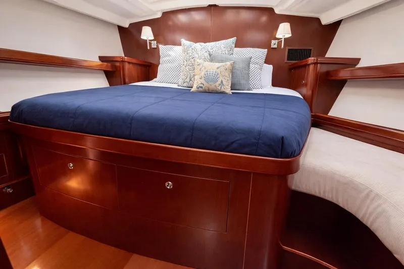 Slide: The Image of Luxurious cabin interior of 2006 Beneteau Oceanis 523 yacht with elegant wood finish. - 55