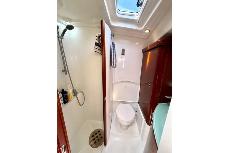 Slide: The Image of Bathroom interior of 2006 Beneteau Oceanis 523 yacht with shower and toilet. - 60