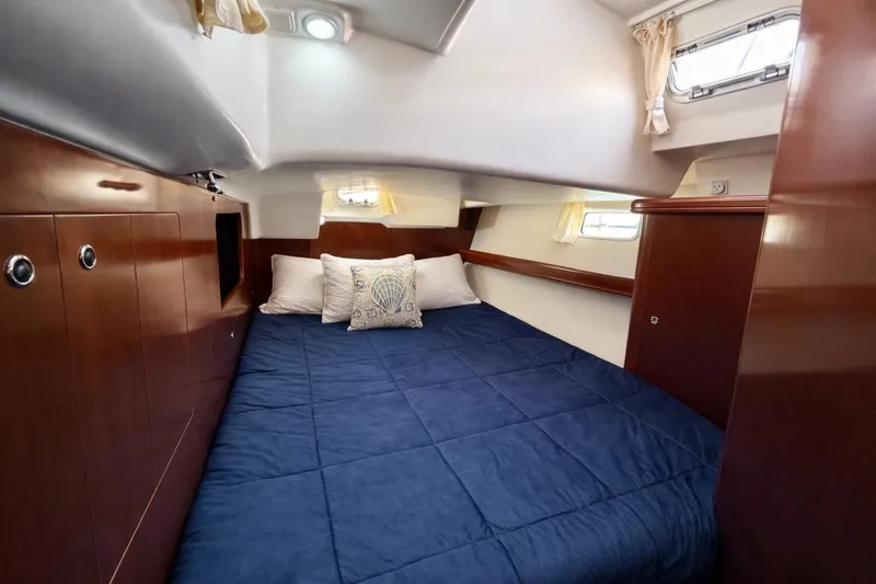 Slide: The Image of Luxurious cabin interior of 2006 Beneteau Oceanis 523 yacht with cozy bedding. - 63