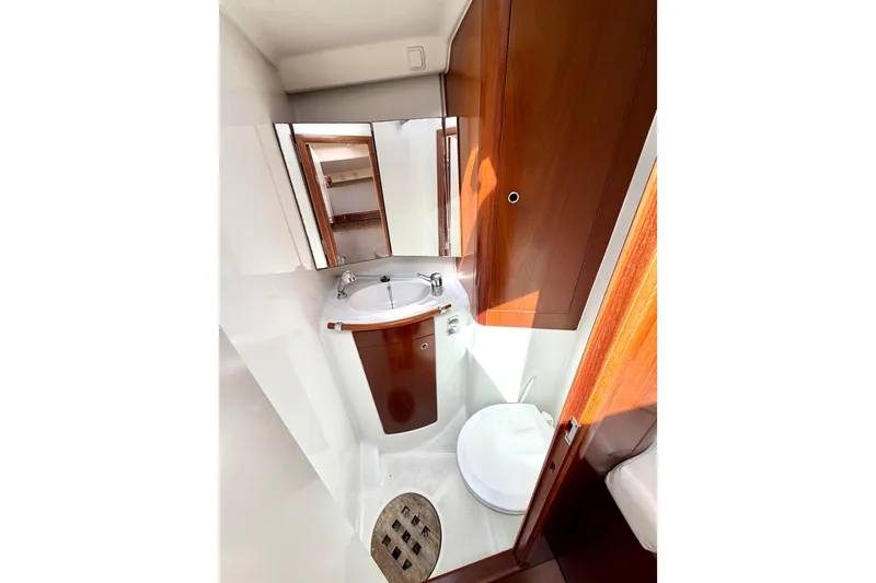 Slide: The Image of Bathroom interior of 2006 Beneteau Oceanis 523 yacht, featuring sink and toilet. - 72