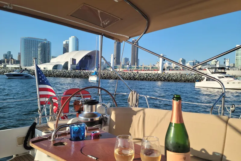 Slide: The Image of Sailing on a 2006 Beneteau Oceanis 523 with city skyline and waterfront views. - 74