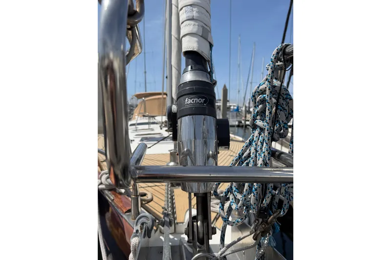 Slide: The Image of Close-up of Beneteau Oceanis 523 sailboat rigging, showcasing Facnor furler system, 2006 model. - 77