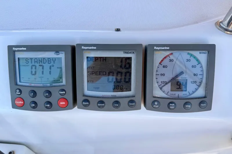 Slide: The Image of Raymarine navigation instruments on a 2006 Beneteau Oceanis 523 yacht dashboard. - 8