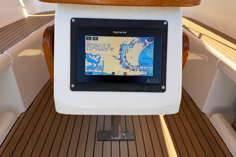 Slide: The Image of Navigation display on 2006 Beneteau Oceanis 523 yacht, showing nautical chart and coordinates. - 9