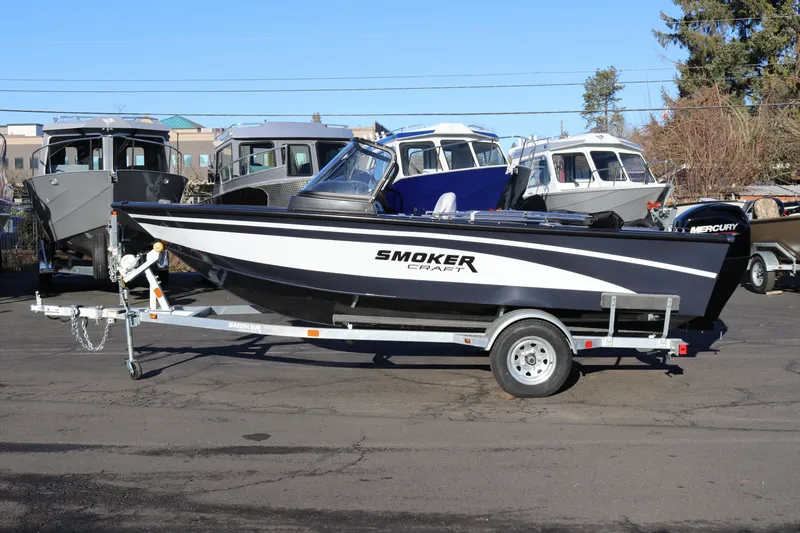 The Image of 2026 Smoker Craft Osprey 162 boat on trailer, parked outdoors. - 1