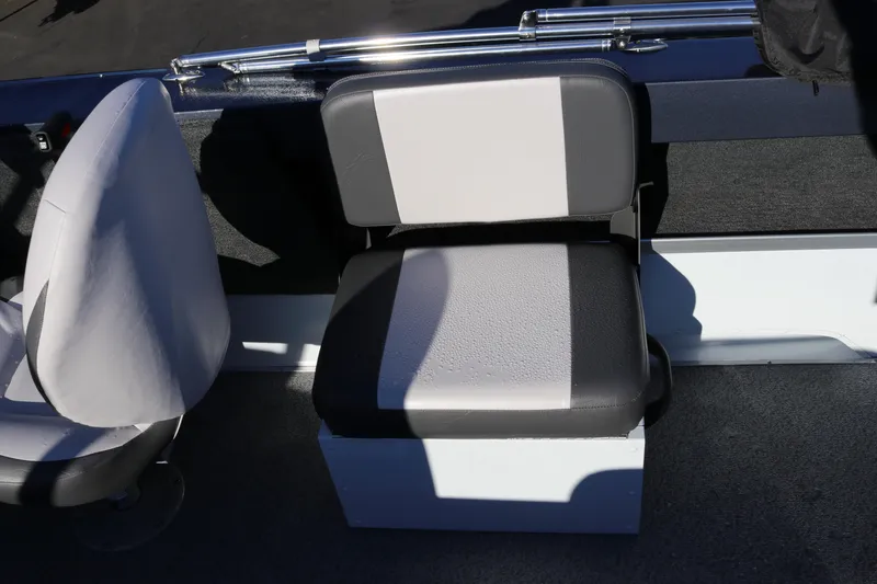 Slide: The Image of 2026 Smoker Craft Osprey 162 boat seat, black and white upholstery, interior view. - 24