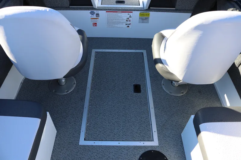 Slide: The Image of Interior of 2026 Smoker Craft Osprey 162 boat with two swivel seats. - 26