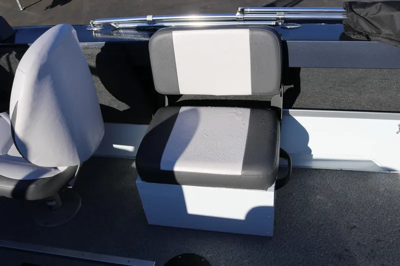 Slide: The Image of Interior seating of 2026 Smoker Craft Osprey 162 boat, featuring modern design and upholstery. - 29