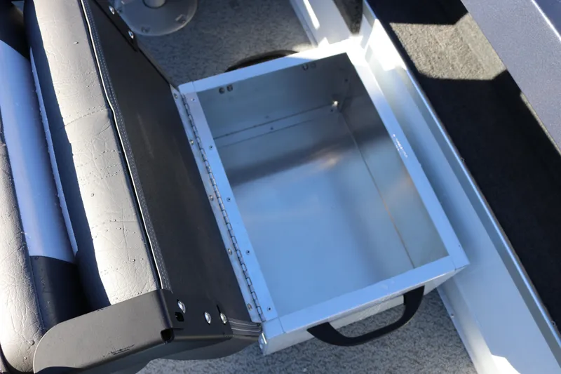Slide: The Image of Storage compartment in 2026 Smoker Craft Osprey 162 boat, featuring a sleek metal design. - 30