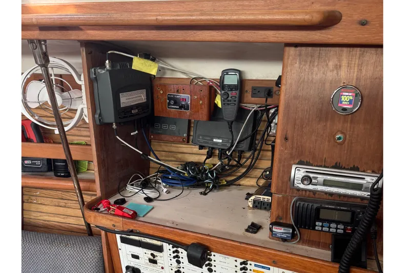 Slide: The Image of Interior of a 2000 Catalina 380 sailboat showing navigation and communication equipment. - 27