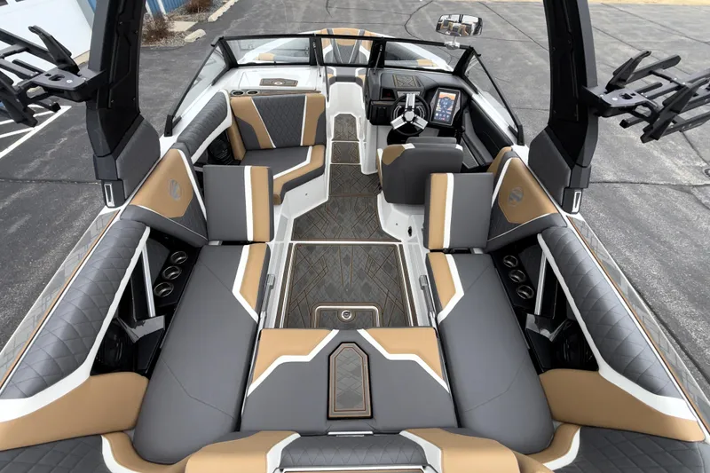 Slide: The Image of 2023 Tigé 23ZX boat interior with luxurious seating and modern dashboard design. - 19
