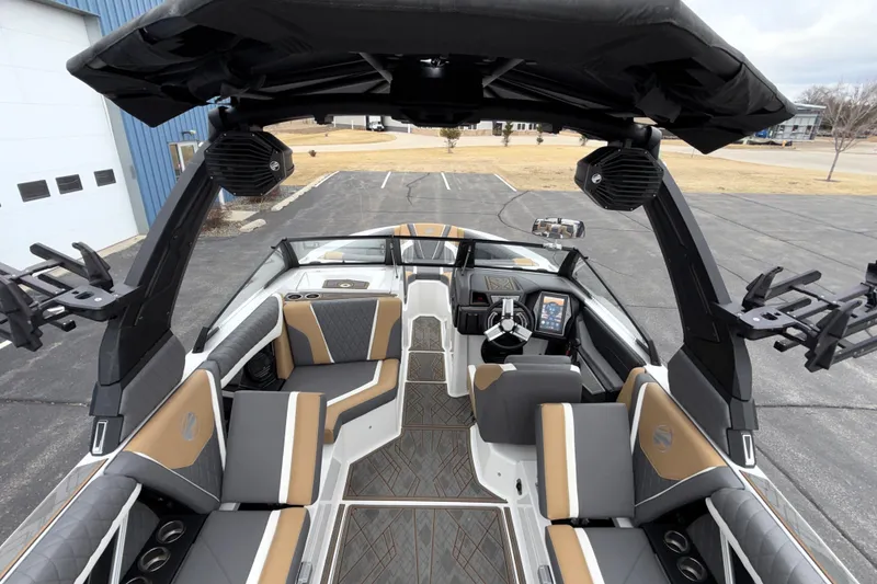 Slide: The Image of 2023 Tigé 23ZX boat interior with luxury seating and advanced dashboard features. - 20
