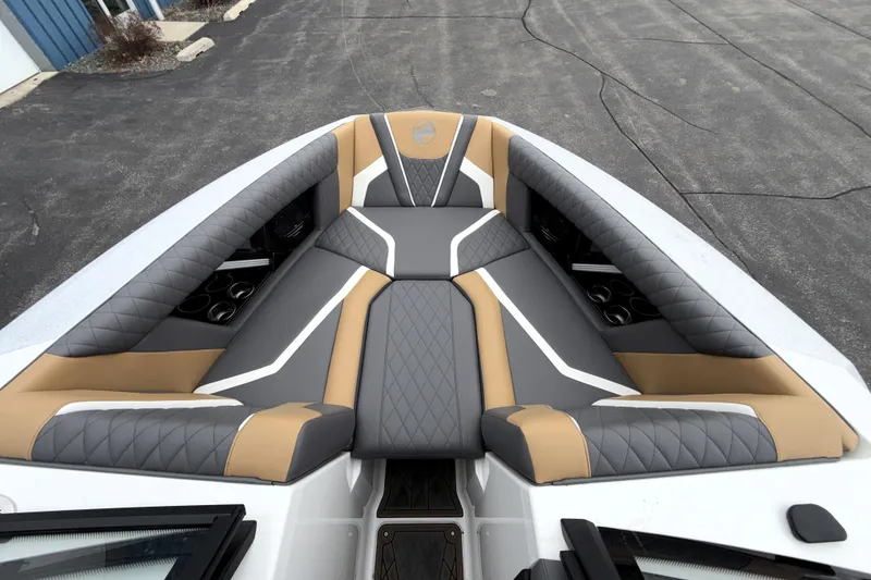 Slide: The Image of 2023 Tigé 23ZX boat interior with stylish gray and tan seating design. - 25