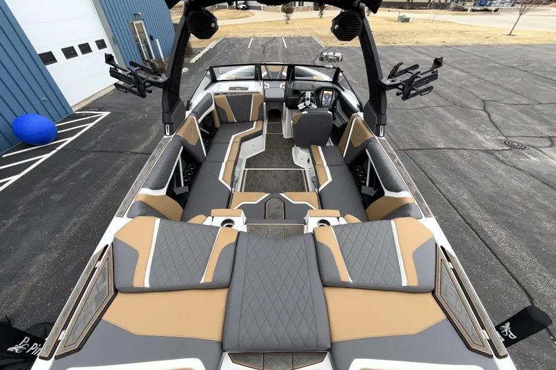 Slide: The Image of 2023 Tigé 23ZX boat interior with luxurious seating and modern design. - 32