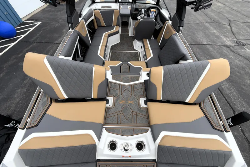 Slide: The Image of 2023 Tigé 23ZX boat interior with luxurious seating and modern design. - 38
