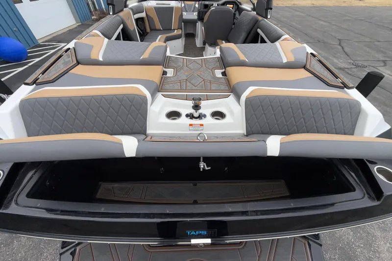 Slide: The Image of 2023 Tigé 23ZX boat interior with stylish seating and modern design. - 42