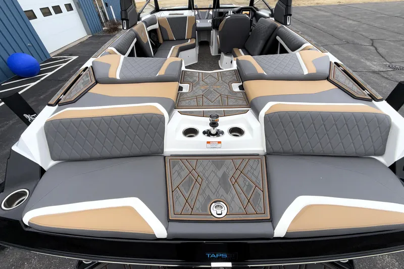 Slide: The Image of 2023 Tigé 23ZX boat interior with luxurious seating and modern design. - 43