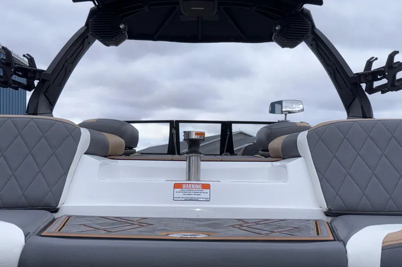 Slide: The Image of 2023 Tigé 23ZX boat interior with quilted seats and sleek design. - 44