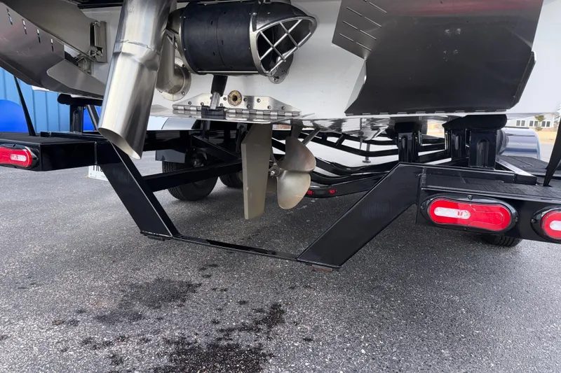 Slide: The Image of 2023 Tigé 23ZX boat trailer with propeller and exhaust system. - 45