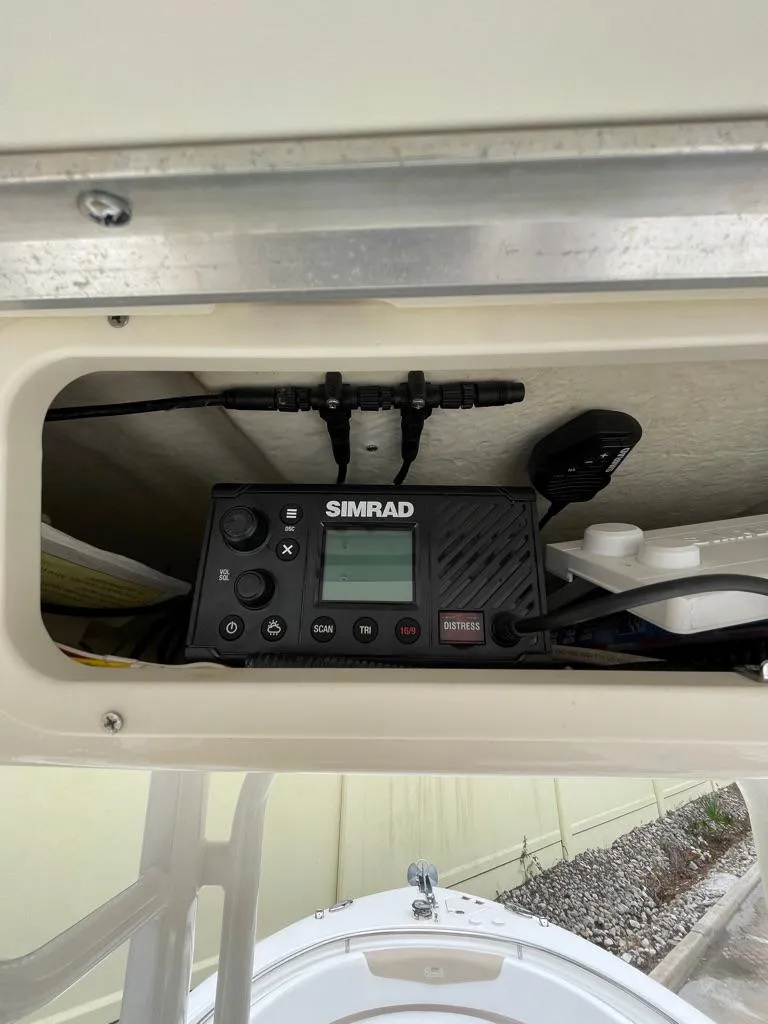 Slide: The Image of Simrad marine electronics on 2019 Robalo R242 Center Console boat. - 23