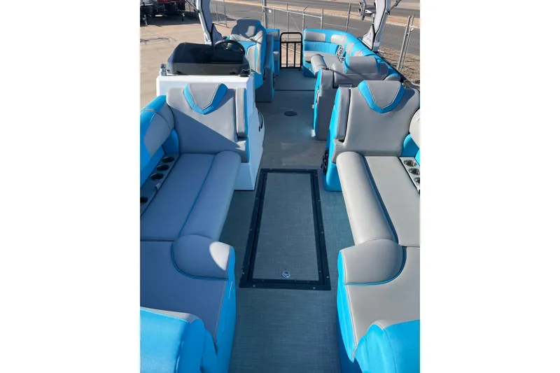 Slide: The Image of 2023 Montara 25 Surf Boss 2.0 CW boat interior with blue and gray seating. - 10