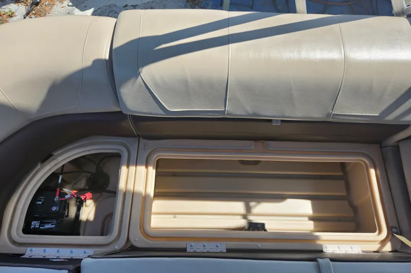 Slide: The Image of Open storage compartment in 2018 Sun Tracker Party Barge 20 DLX pontoon boat. - 25