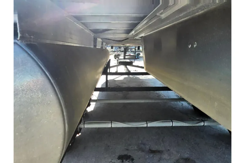 Slide: The Image of Underneath view of a 2018 Sun Tracker Party Barge 20 DLX pontoon boat. - 33