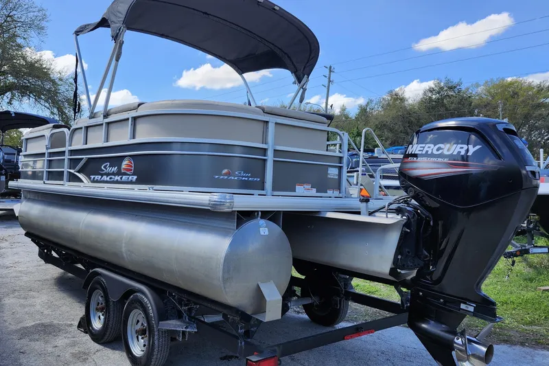 Slide: The Image of 2018 Sun Tracker Party Barge 20 DLX pontoon boat with Mercury outboard motor. - 4