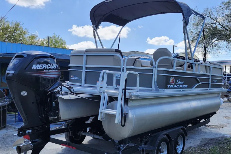 Slide: The Image of 2018 Sun Tracker Party Barge 20 DLX pontoon boat with Mercury outboard motor. - 6