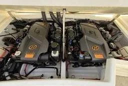 Slide: The Image of Twin engines in a 2000 Formula boat, showcasing powerful marine engineering. - 6