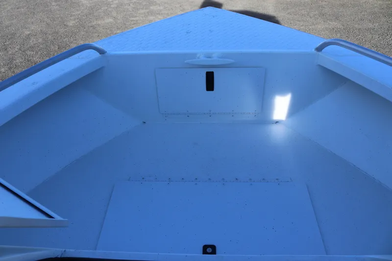 Slide: The Image of 2026 Alumaweld Intruder Outboard 22 boat interior, featuring spacious storage compartments. - 38