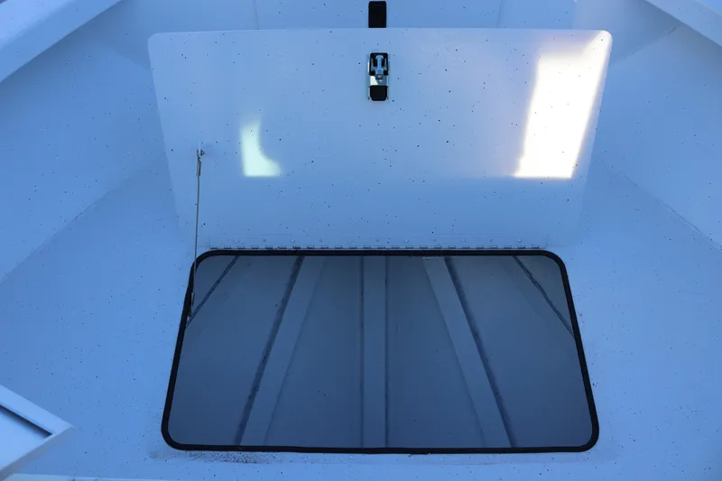 Slide: The Image of 2026 Alumaweld Intruder Outboard 22 boat interior storage compartment. - 41