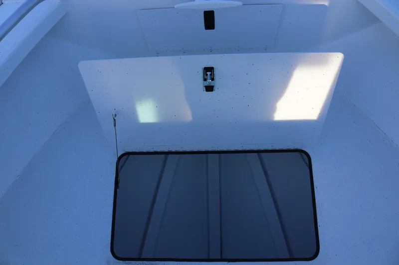 Slide: The Image of 2026 Alumaweld Intruder Outboard 22 boat interior with storage compartment. - 42