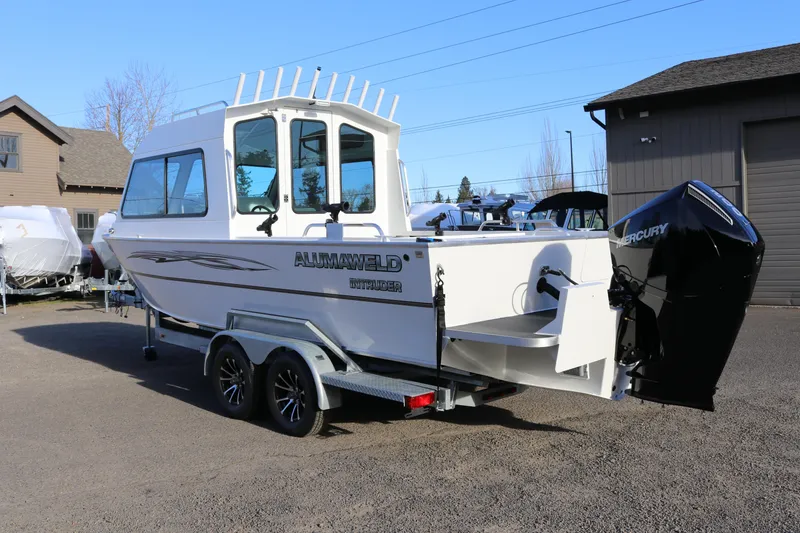 Slide: The Image of 2026 Alumaweld Intruder Outboard 22 boat with Mercury engine on trailer. - 45