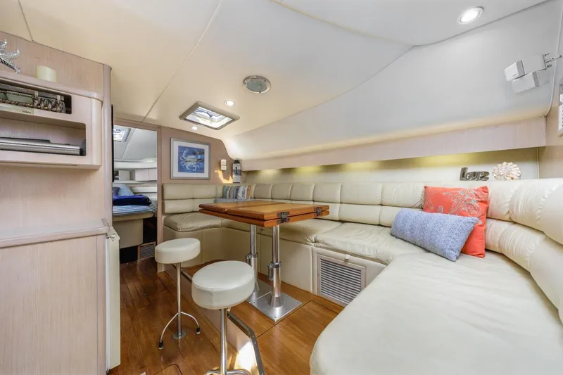 Slide: The Image of Interior of 2000 Tiara Yachts 4000 Express with cozy seating and modern decor. - 24