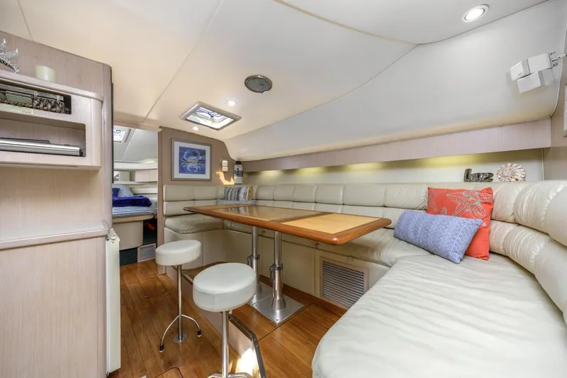 Slide: The Image of Luxurious interior of 2000 Tiara Yachts 4000 Express with plush seating and elegant decor. - 25