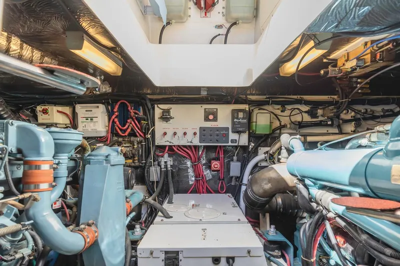 Slide: The Image of Electrical panel inside a 2000 Tiara Yachts 4000 Express, showcasing control switches and meters. - 33