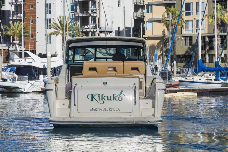 Slide: The Image of Tiara Yachts 4000 Express 2000 at Marina del Rey, California, docked with cityscape backdrop. - 6