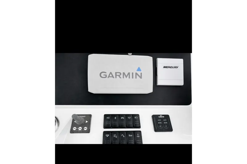 Slide: The Image of 2024 Beneteau Flyer 8 SPACEdeck dashboard featuring Garmin and Mercury controls. - 13