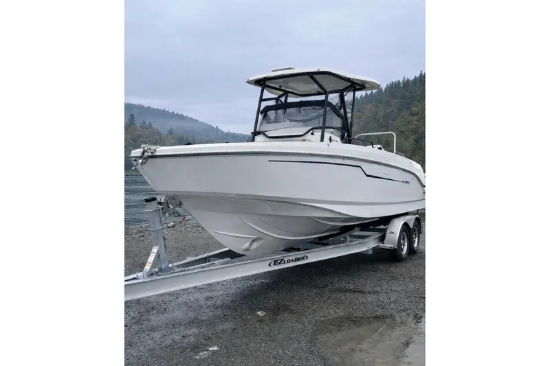 Slide: The Image of 2024 Beneteau Flyer 8 SPACEdeck boat on trailer, scenic outdoor setting. - 2